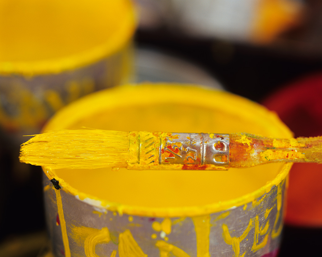 Yellow Paint and Brush